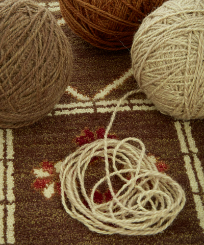 Brown Script Heritage Wool Round Rug